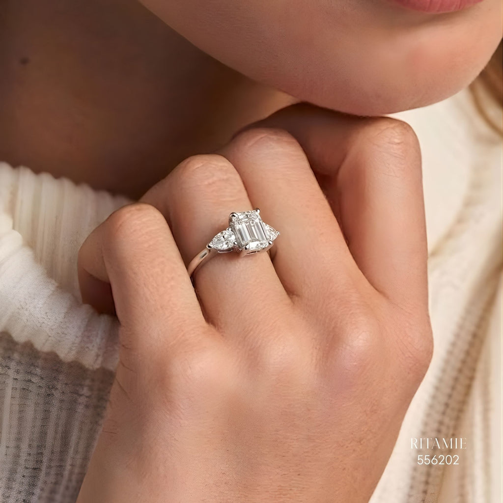 Emerald Pear Three-Stone Moissanite Ring 556202